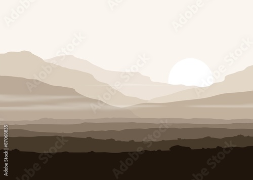 Lifeless landscape with huge mountains over sun.