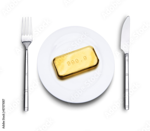 Teller mit Goldbarren