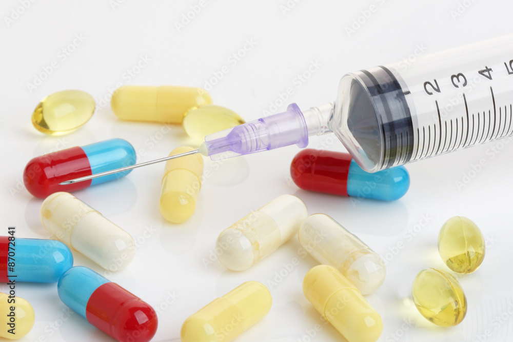Hypodermic Needle and Capsules. Macro Health Concept Hypodermic Needle and Capsules. Macro Health Concept