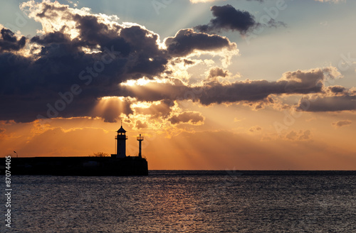 Beacon in Yalta at sunrise, a view from the central city embankment, the Crimea