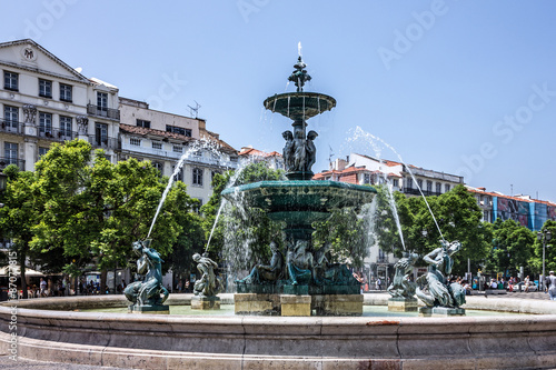 Rossio square with fountain located at Baixa district in Lisbon