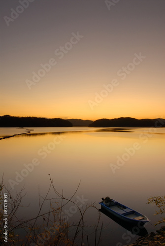 Calm lake with boat