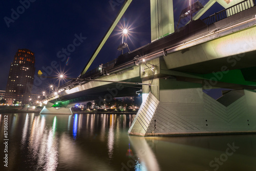 frankfurt floesser bridge in germany at night photo