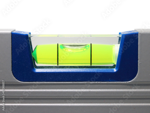 Industrial background from close up of spirit level. Precision tool for craftmens. Measurement and production.