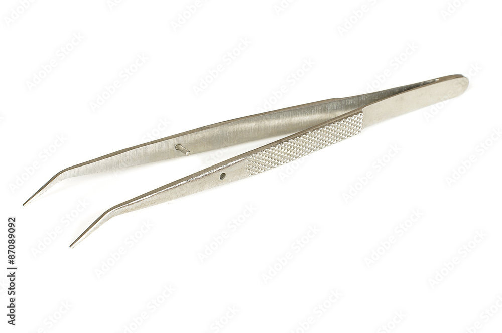 Pair of tweezers isolated on the white background Pair of tweezers isolated on the white background