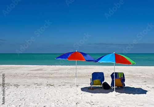 Beach Chairs with Umbrella © EyeMark