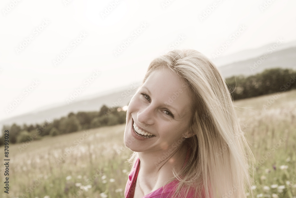 Photo of pretty blonde woman on a field Photo of pretty blonde woman on a field