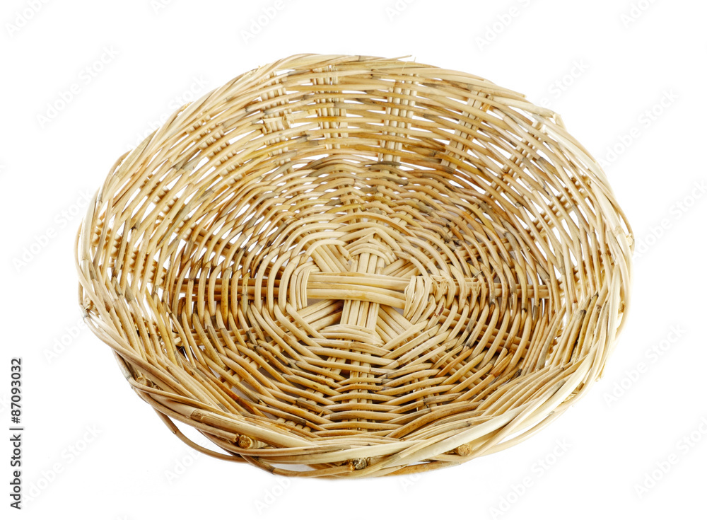 Fototapeta premium Wicker basket on white background