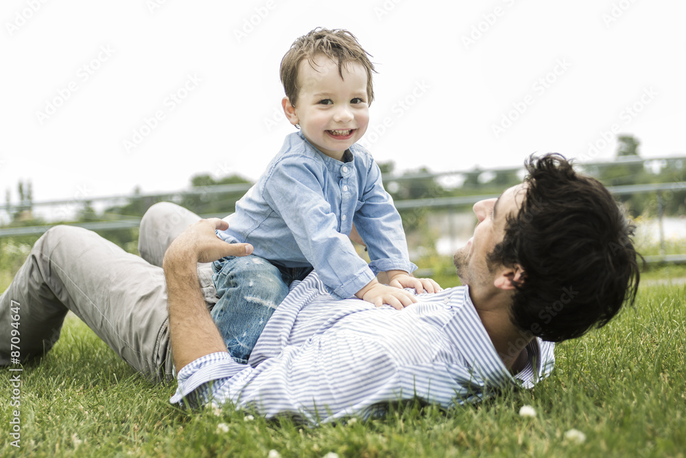 happy joyful father having fun with is child
