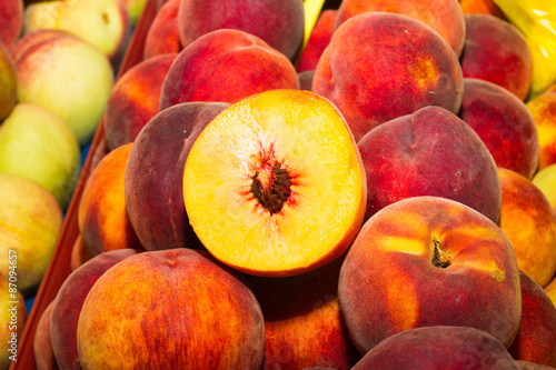 Juicy super fruit, ripe peaches at local fruit market bazaar
