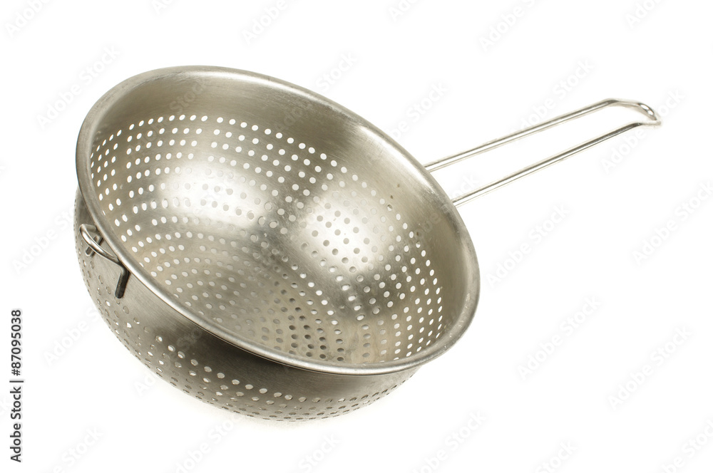Kitchen stainless steel strainer isolated on the white background Kitchen stainless steel strainer isolated on the white background