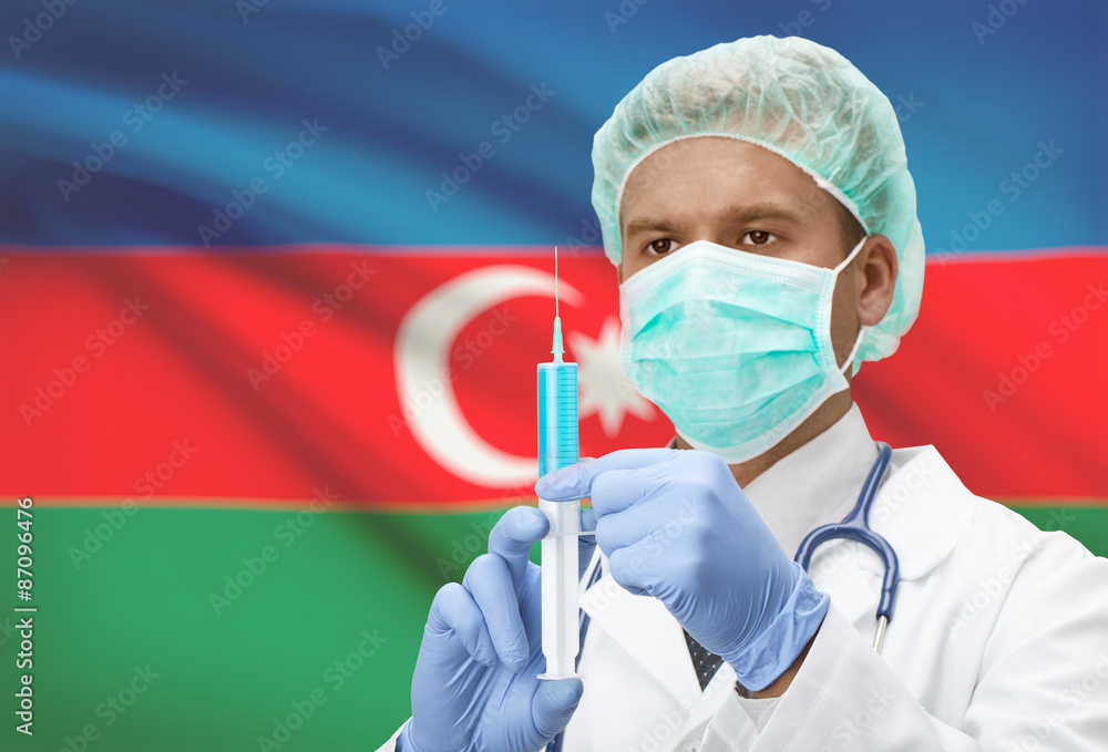 Doctor with syringe in hands and flag on background series - Azerbaijan Doctor with syringe in hands and flag on background series - Azerbaijan