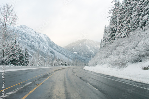 beautiful road on the snow in winter time.