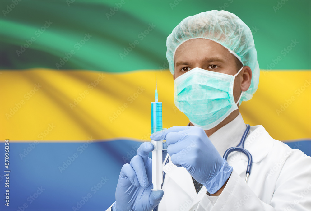 Doctor with syringe in hands and flag on background series - Gabon