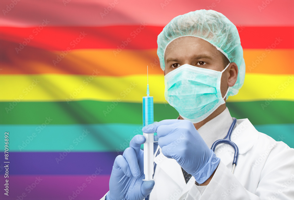 Doctor with syringe in hands and flag on background series - LGBT people Doctor with syringe in hands and flag on background series - LGBT people