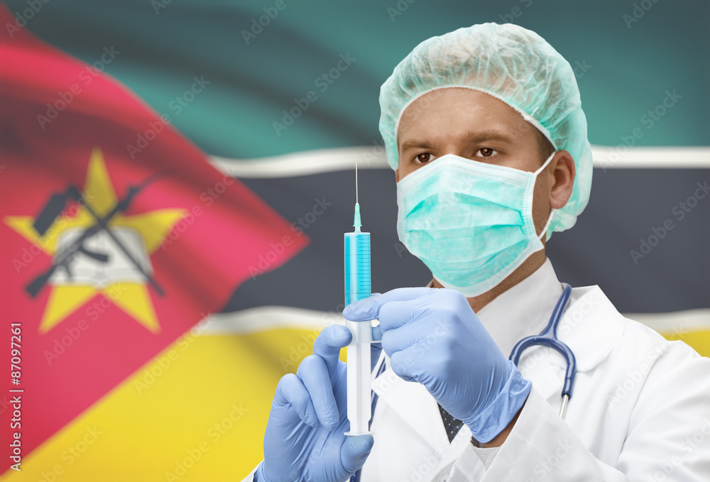 Doctor with syringe in hands and flag on background series - Mozambique Doctor with syringe in hands and flag on background series - Mozambique