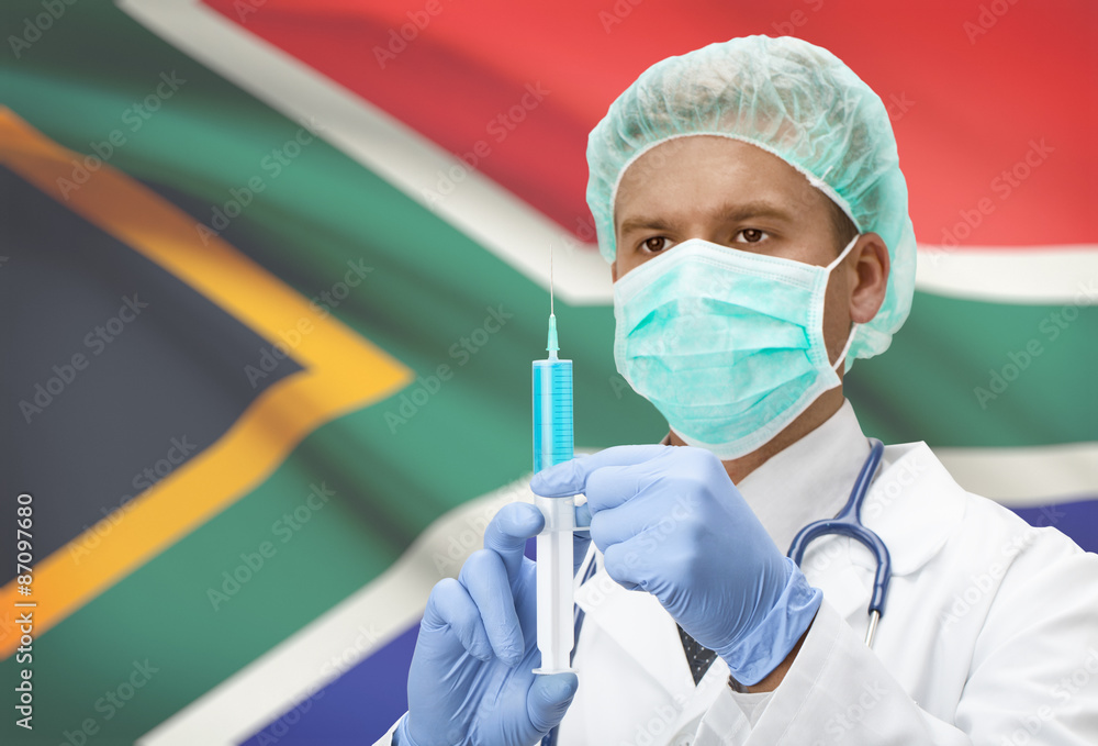 Doctor with syringe in hands and flag on background series - South Africa Doctor with syringe in hands and flag on background series - South Africa