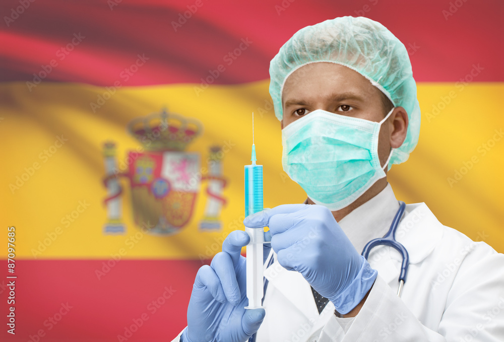 Doctor with syringe in hands and flag on background series - Spain Doctor with syringe in hands and flag on background series - Spain