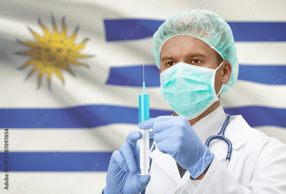 Doctor with syringe in hands and flag on background series - Uruguay Doctor with syringe in hands and flag on background series - Uruguay