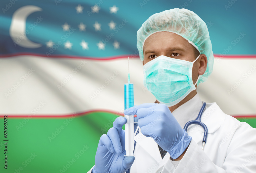 Doctor with syringe in hands and flag on background series - Uzbekistan Doctor with syringe in hands and flag on background series - Uzbekistan