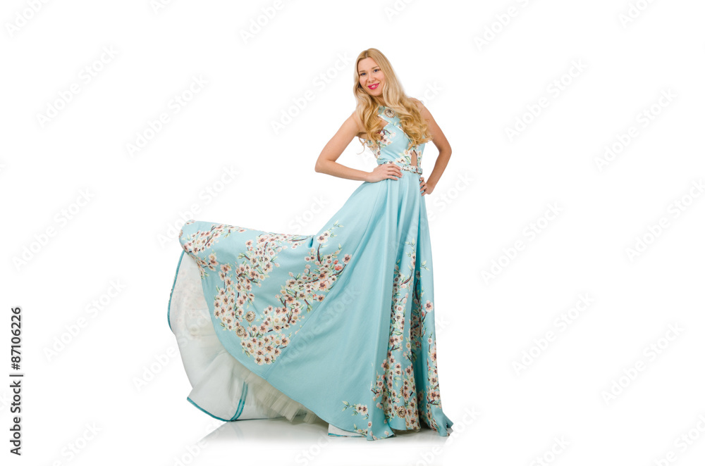 Woman in blue long dress with flower prints isolated on white Woman in blue long dress with flower prints isolated on white
