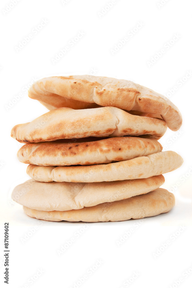 Pita Bread Stack – A stack of pita bread on a white background. Pita Bread Stack – A stack of pita bread on a white background.
