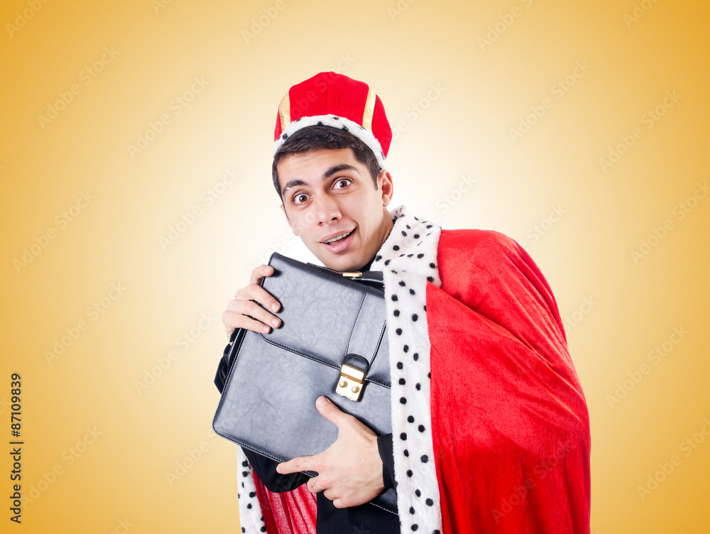 Businessman playing king against the gradient Businessman playing king against the gradient
