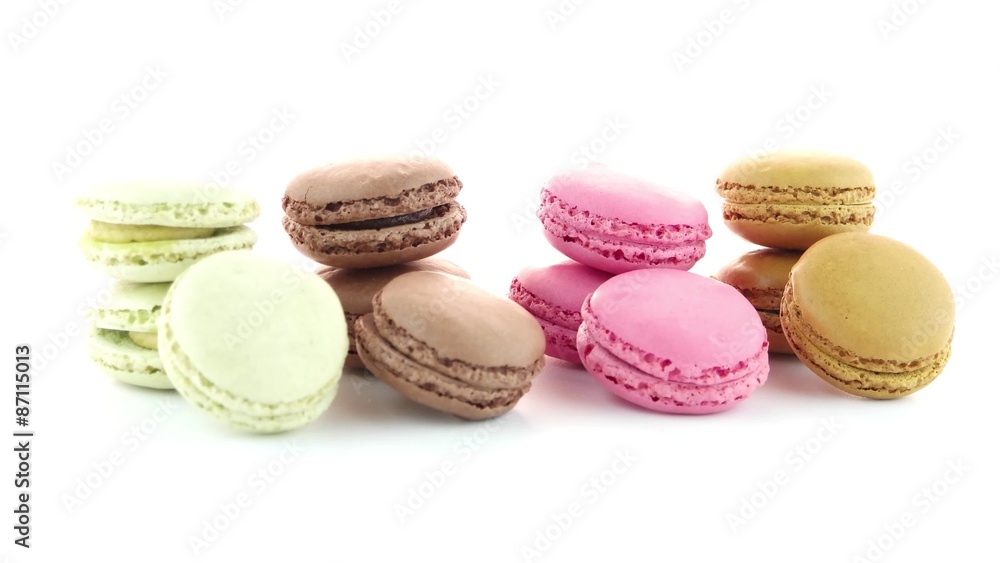 Colorful French Macarons on the white background.