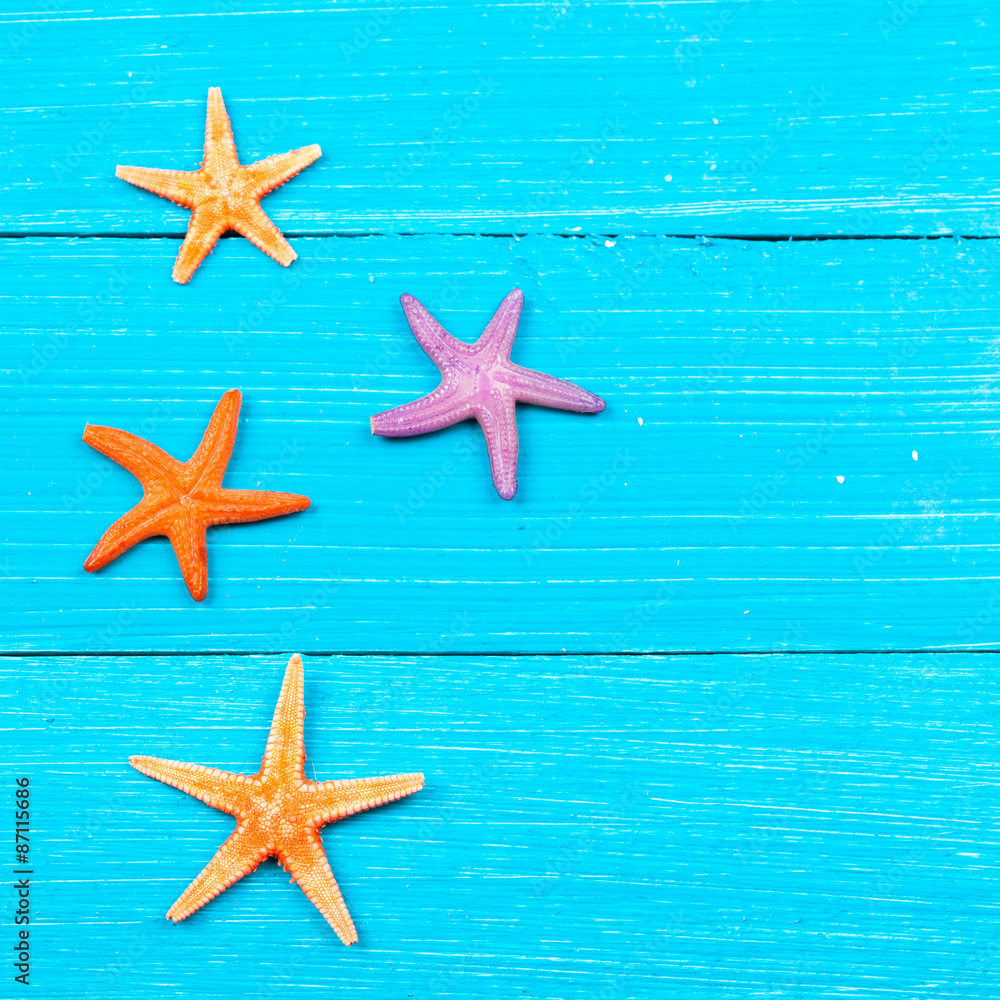 starfish on painted rustic wooden boards starfish on painted rustic wooden boards