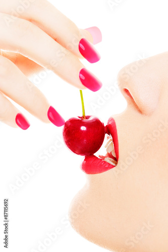 Wallpaper Mural Close up of red cherry, manicured nails and lips.  isolated on white. Sexy lipstick.isolated on white.  Torontodigital.ca