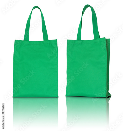 green fabric bag on white background