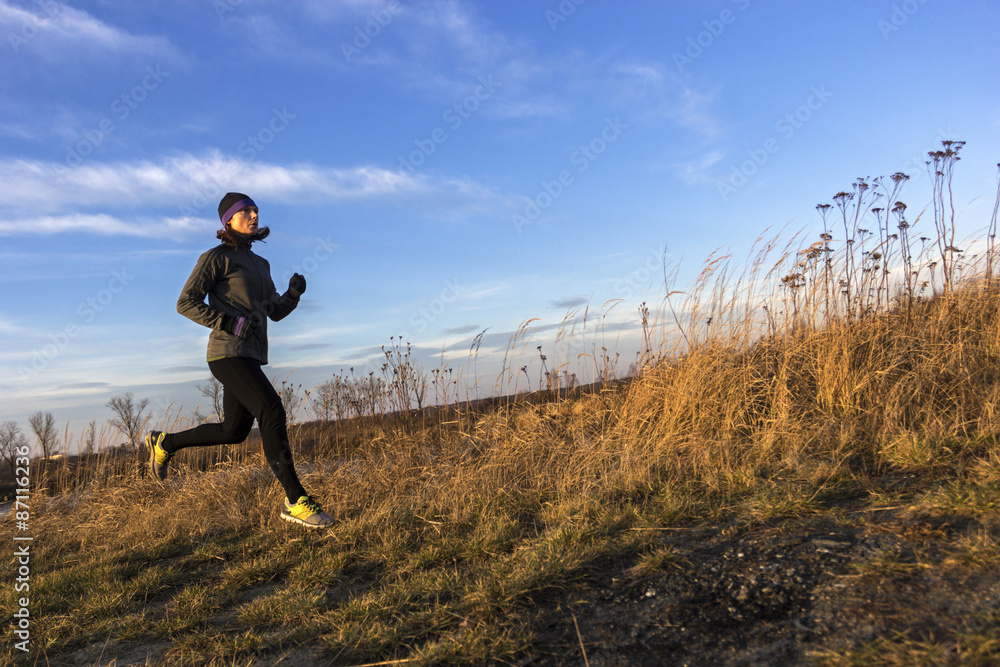 Female jogger in the morning Female jogger in the morning