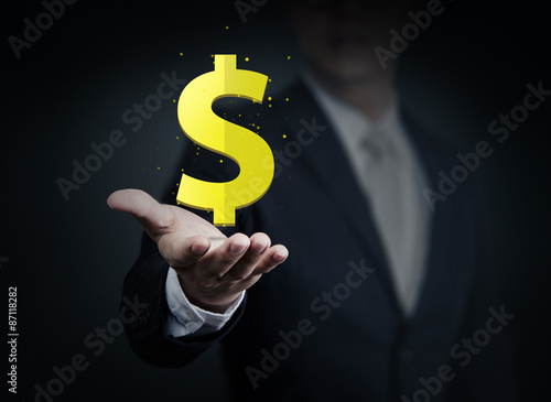 Close up of businessman holding Money in hand, business collecti photo