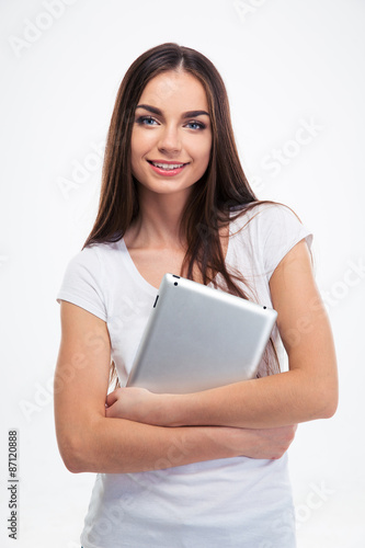 Smiling pretty woman holding tablet computer