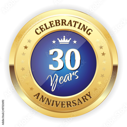 Blue celebrating 30 years badge with gold border