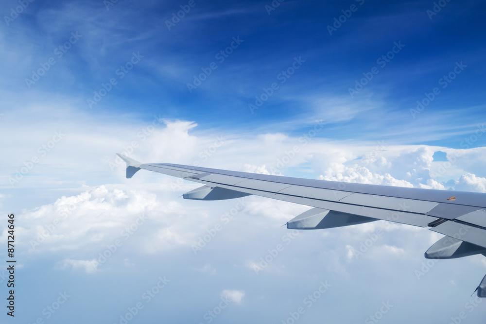 airplane wing on the clouds sea airplane wing on the clouds sea