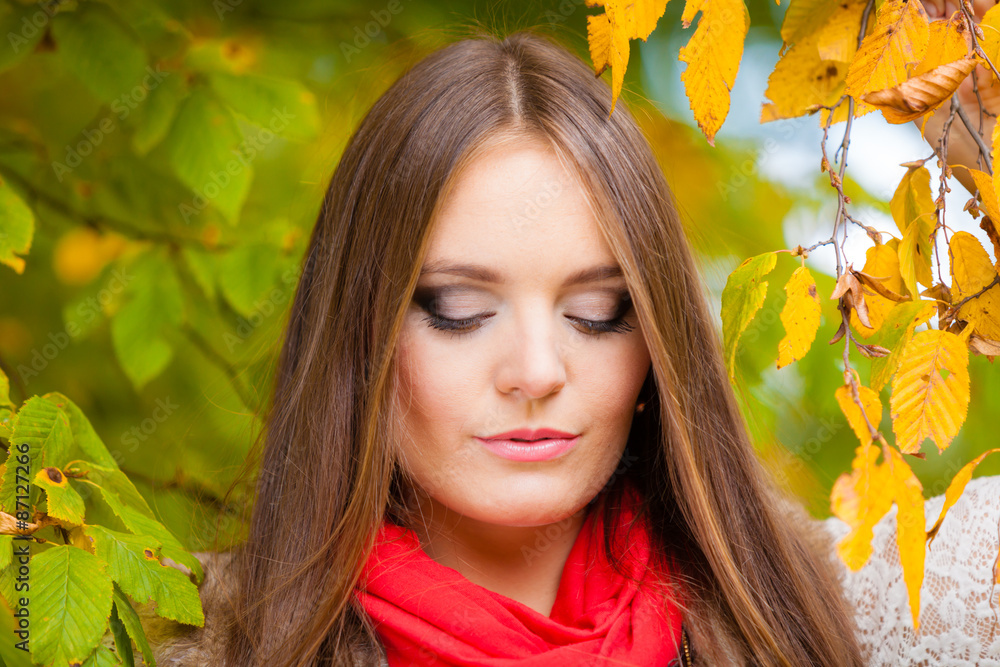 Portrait girl relaxing walking in autumnal park. Portrait girl relaxing walking in autumnal park.
