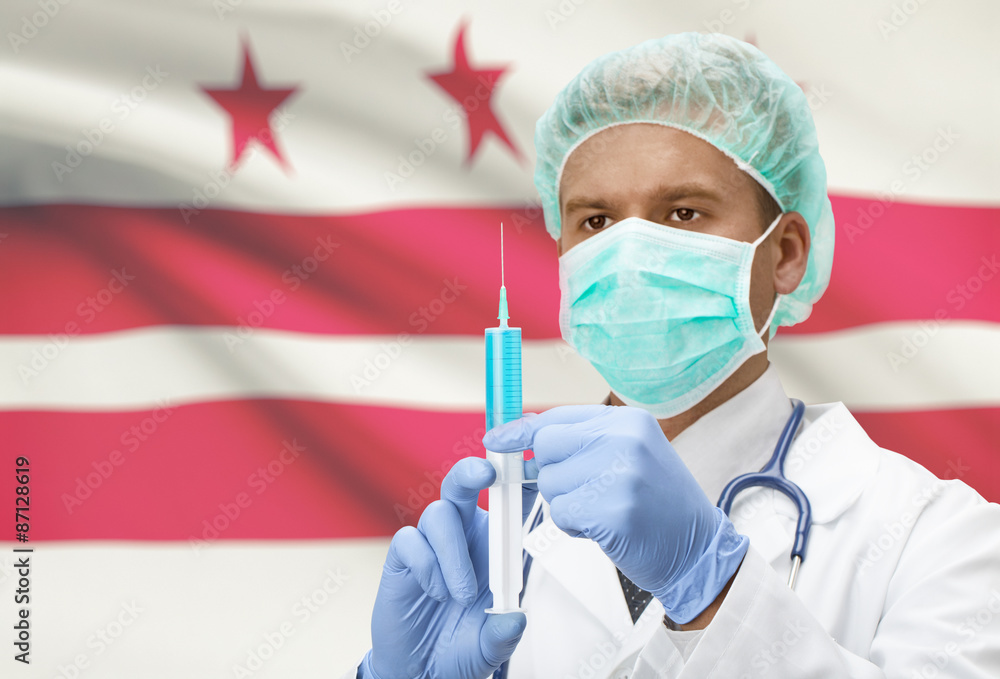 Doctor with syringe in hands and US states flags on background series - District of Columbia Doctor with syringe in hands and US states flags on background series - District of Columbia