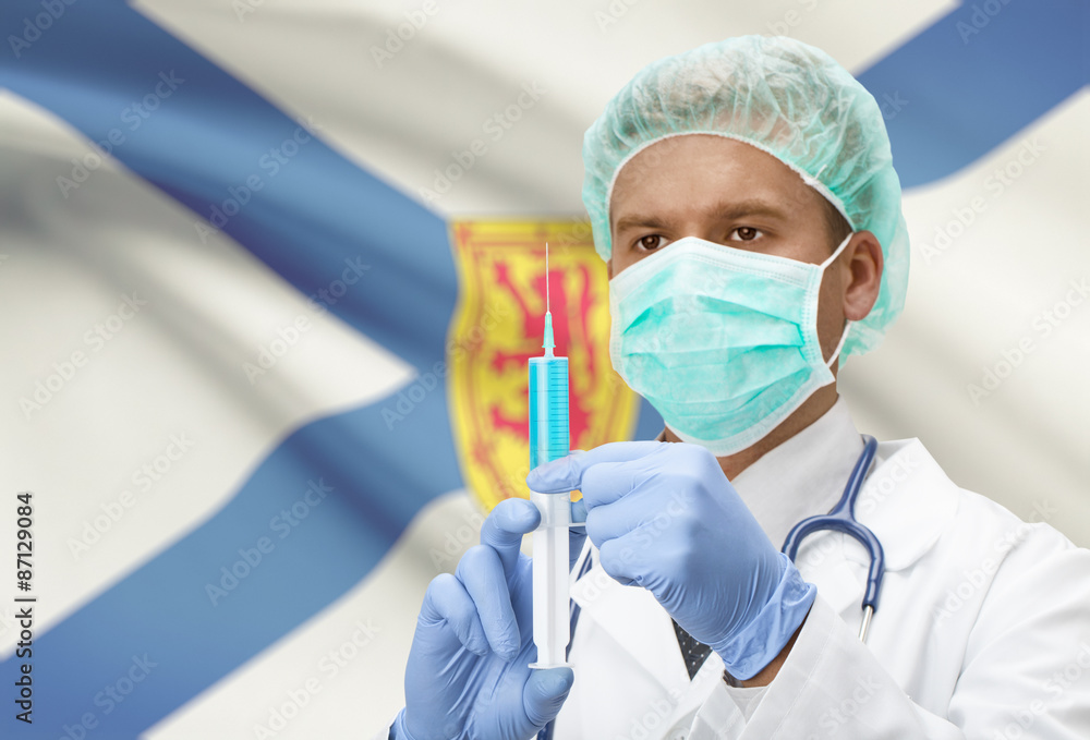 Doctor with syringe in hands and Canadian province flag on background series - Nova Scotia Doctor with syringe in hands and Canadian province flag on background series - Nova Scotia