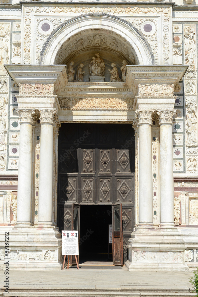 Entrance door of Certosa at Pavia medieval church and monastery