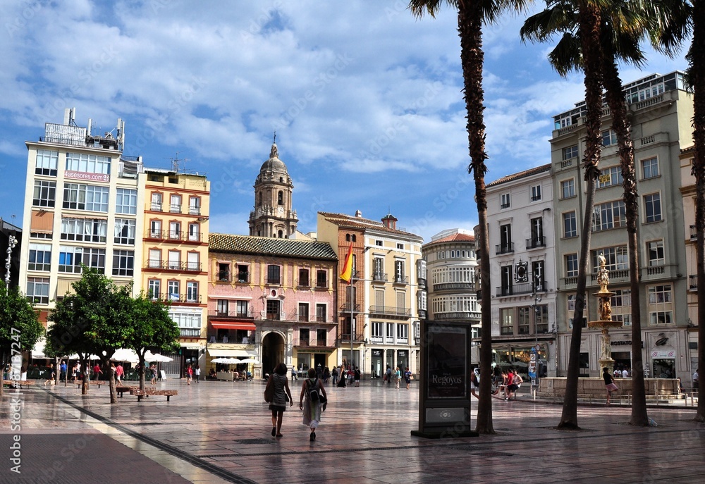 MALAGA, SPAIN - OCTOBER 4:Tourists walk around the historic center of Malaga on October 4, 2014.