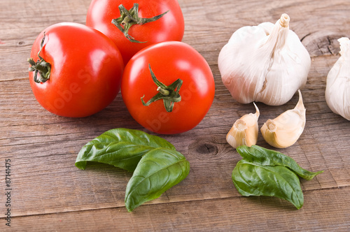 Tomatoes, garlic and basil. 