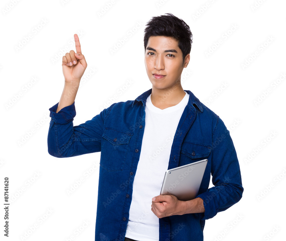 Chinese mixed iranian man hold with tablet and finger point up Chinese mixed iranian man hold with tablet and finger point up