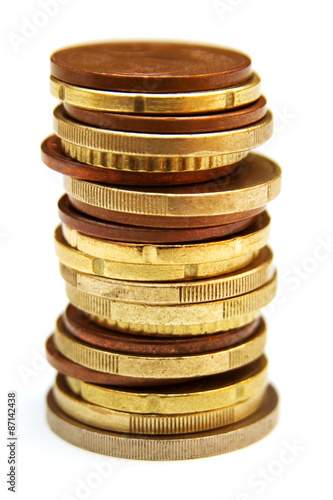 stack of coins isolated on white background