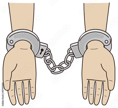 手錠をかけられる人