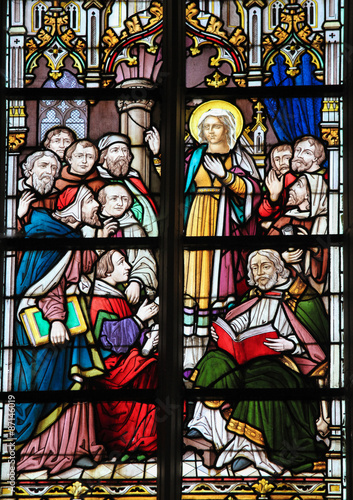 Stained Glass window in a catholic church photo