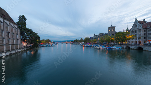 Zurich cityscape with Limmat river and old town city center on evening or night
