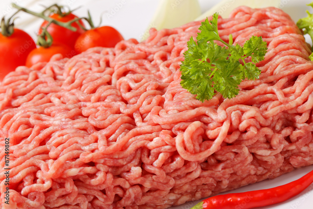 Raw ground pork and vegetables Raw ground pork and vegetables