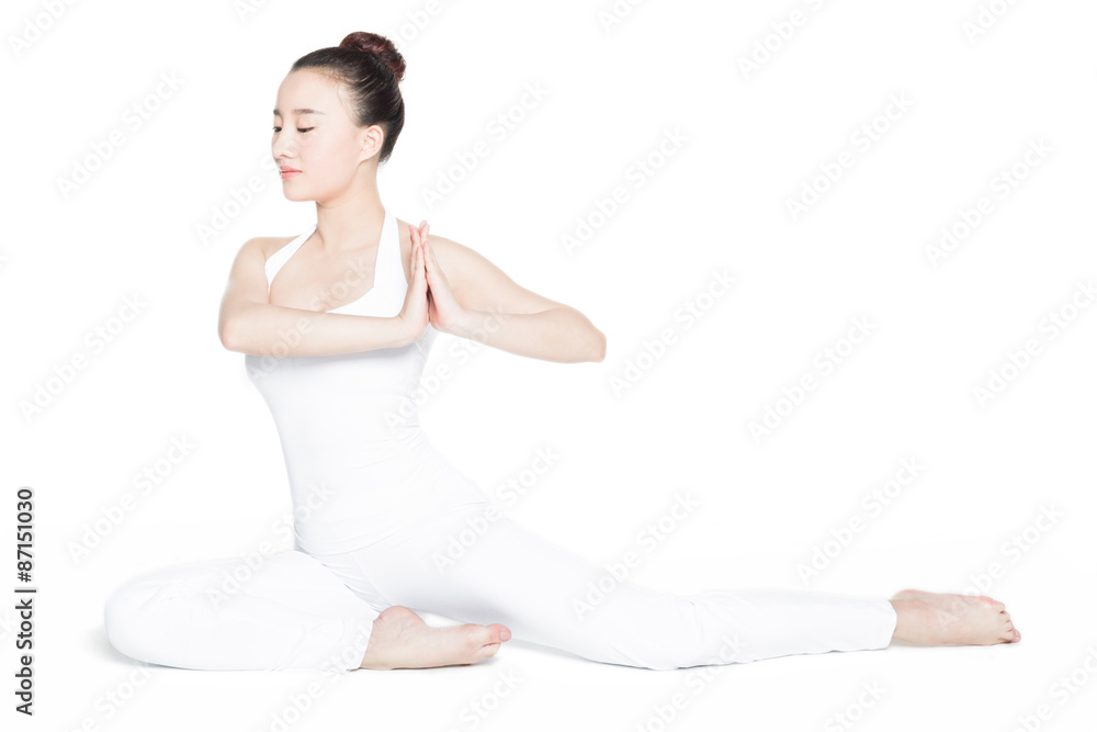 people sitting in lotus position during yoga class people sitting in lotus position during yoga class
