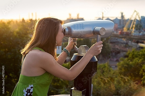 beautiful tourist binoculars at sunset